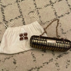 BCBGMAXAZRIA Sophia Clutch gold and black clutch/shoulder bag.